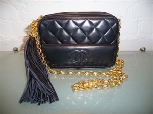 CHANEL BLACK LEATHER WITH OVERSIZED TASSLE DEADSTOCK 80S Y HALF BY 5 HALF BY 3.JPG (1)