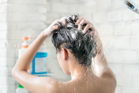 asian-women-bathing-she-was-bathing-washing-hair-she-is-happy_46139-620